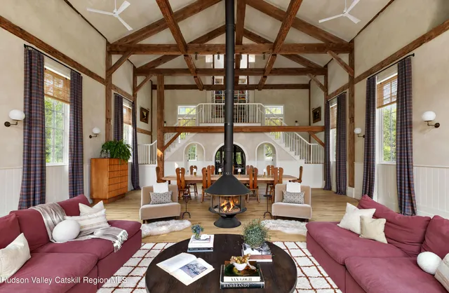 a view of a kitchen with sink and window