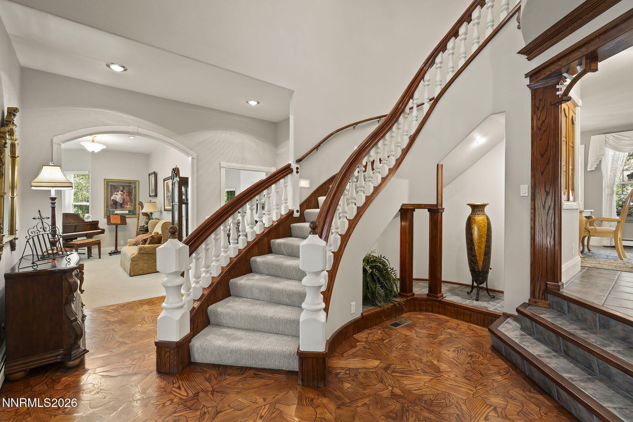30 Francovich Court Reno, NV 89519 - Photo 18 of 79 a view of staircase with lots of frames and couches