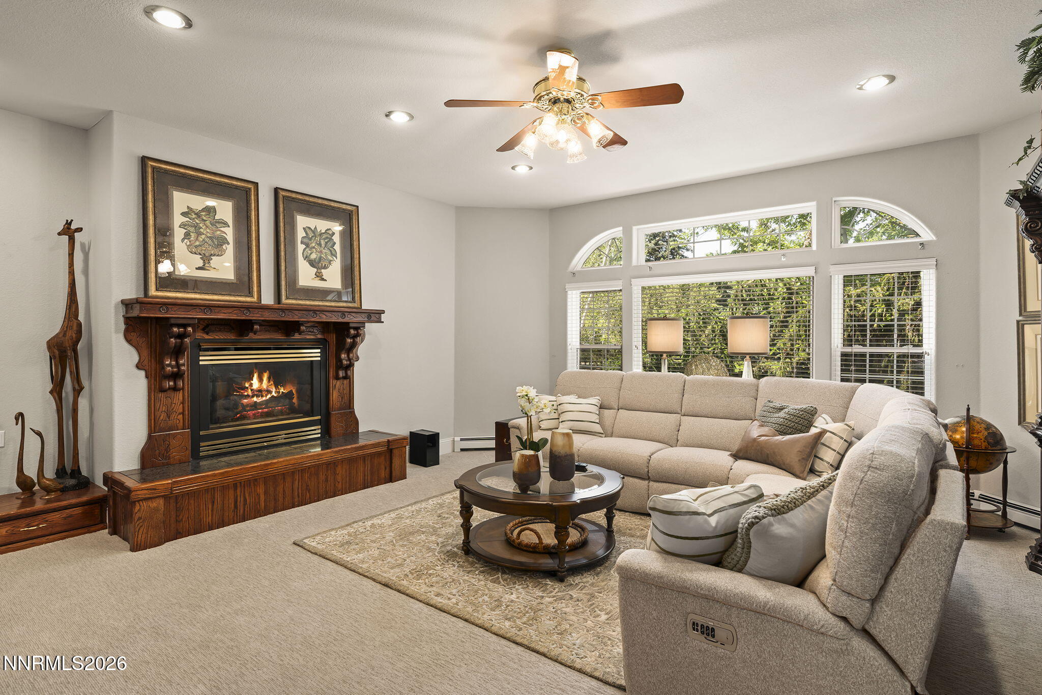 30 Francovich Court Reno, NV 89519 - Photo 27 of 79 a living room with furniture a large window and a fireplace
