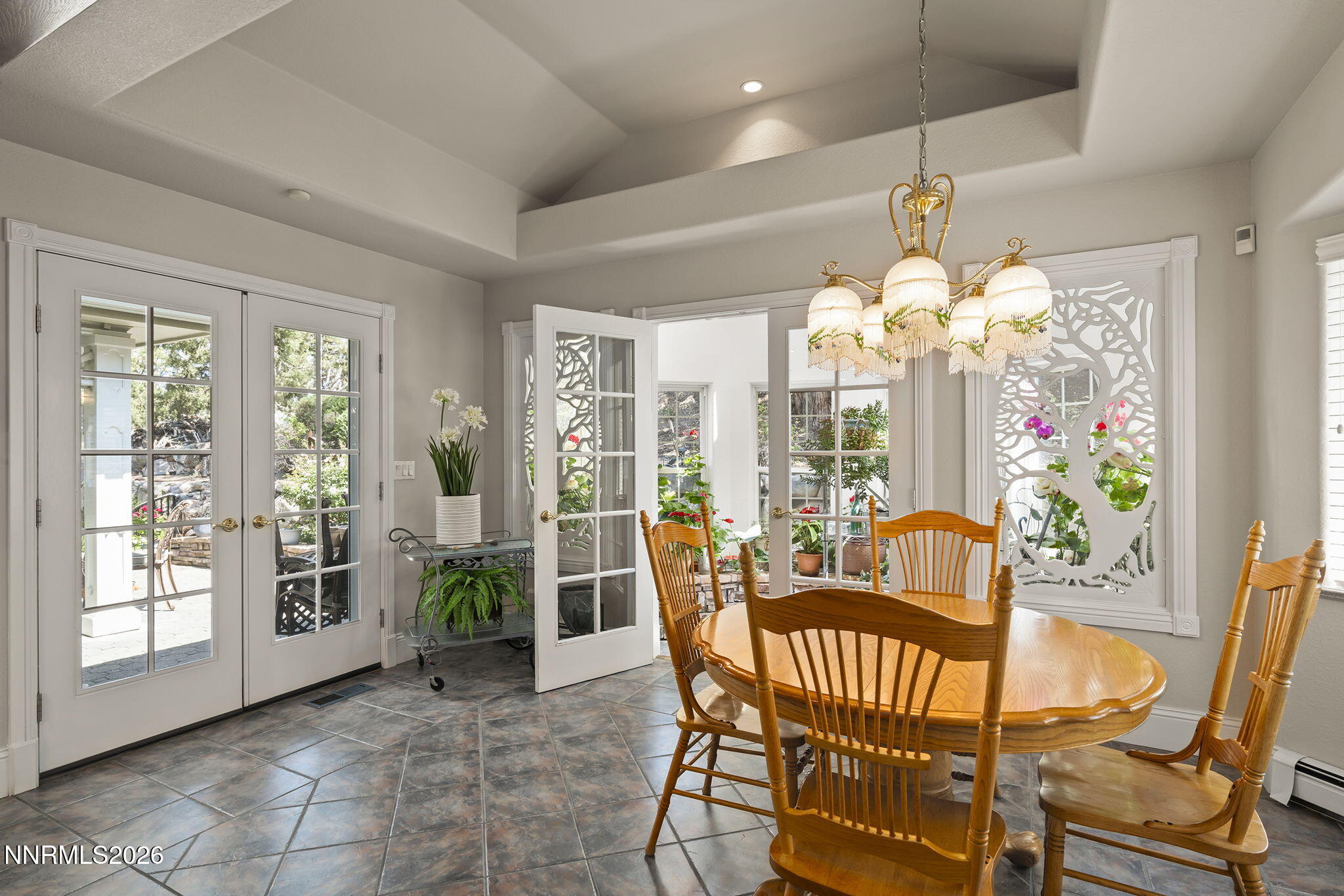 30 Francovich Court Reno, NV 89519 - Photo 34 of 79 a view of a dining room with furniture wooden floor and chandelier