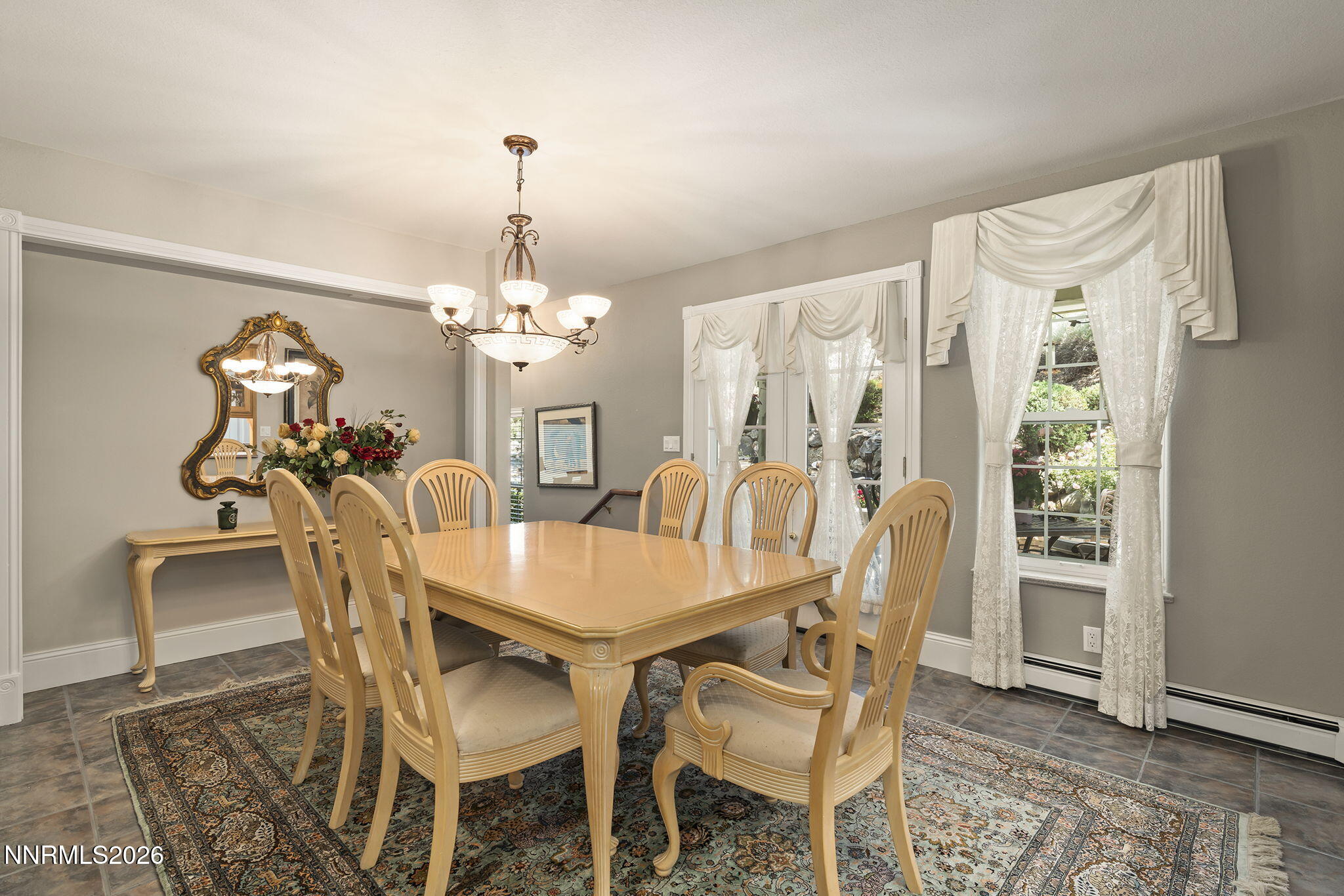30 Francovich Court Reno, NV 89519 - Photo 36 of 79 a dining room with furniture a chandelier and wooden floor