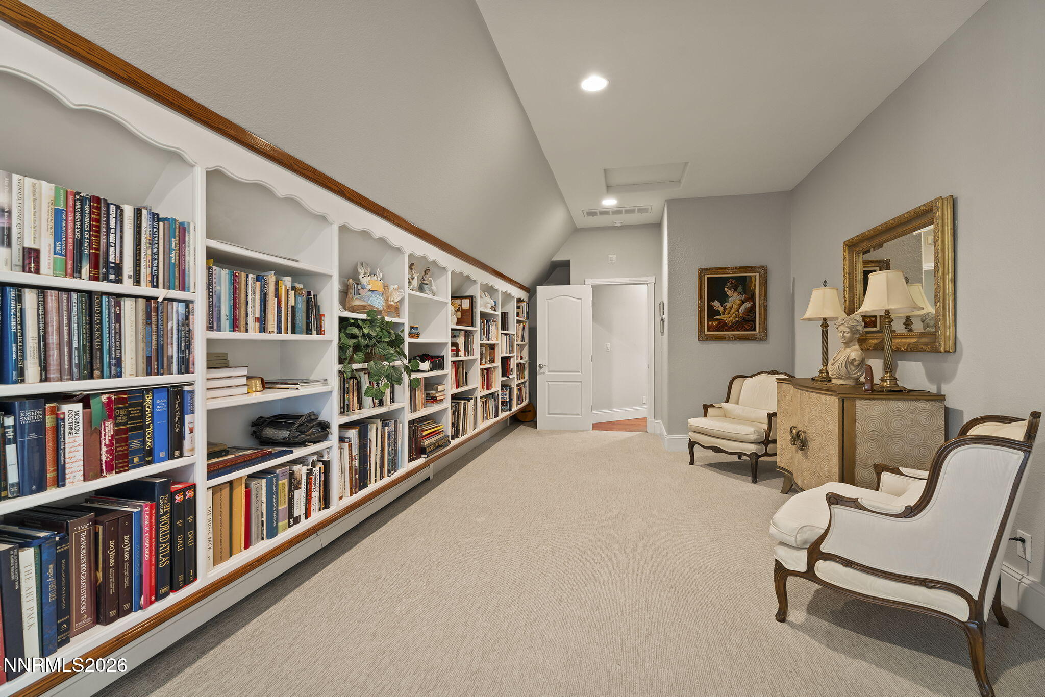30 Francovich Court Reno, NV 89519 - Photo 41 of 79 a living room with lots of furniture and a book shelf