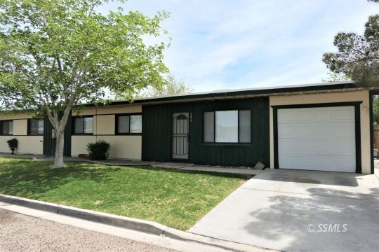 204 Sahara Drive Ridgecrest, CA 93555 - Photo 2 of 24 a front view of a house with a yard