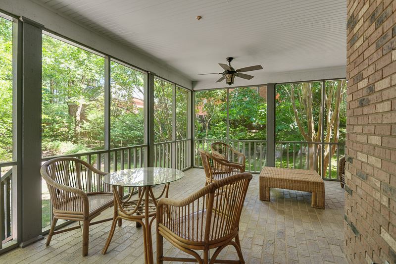 388 South Shady Grove Road Memphis, TN 38120 - Photo 10 of 25 Your very own private screened porch, just off your bedroom. What a fun spot for morning coffee, quiet reflection, to listen to the birds, or to listen to the rain. Note the elevation, which even adds more privacy!