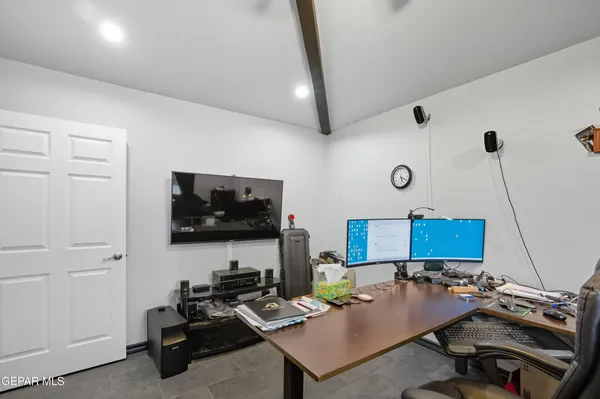 a view of a street with a building in the background