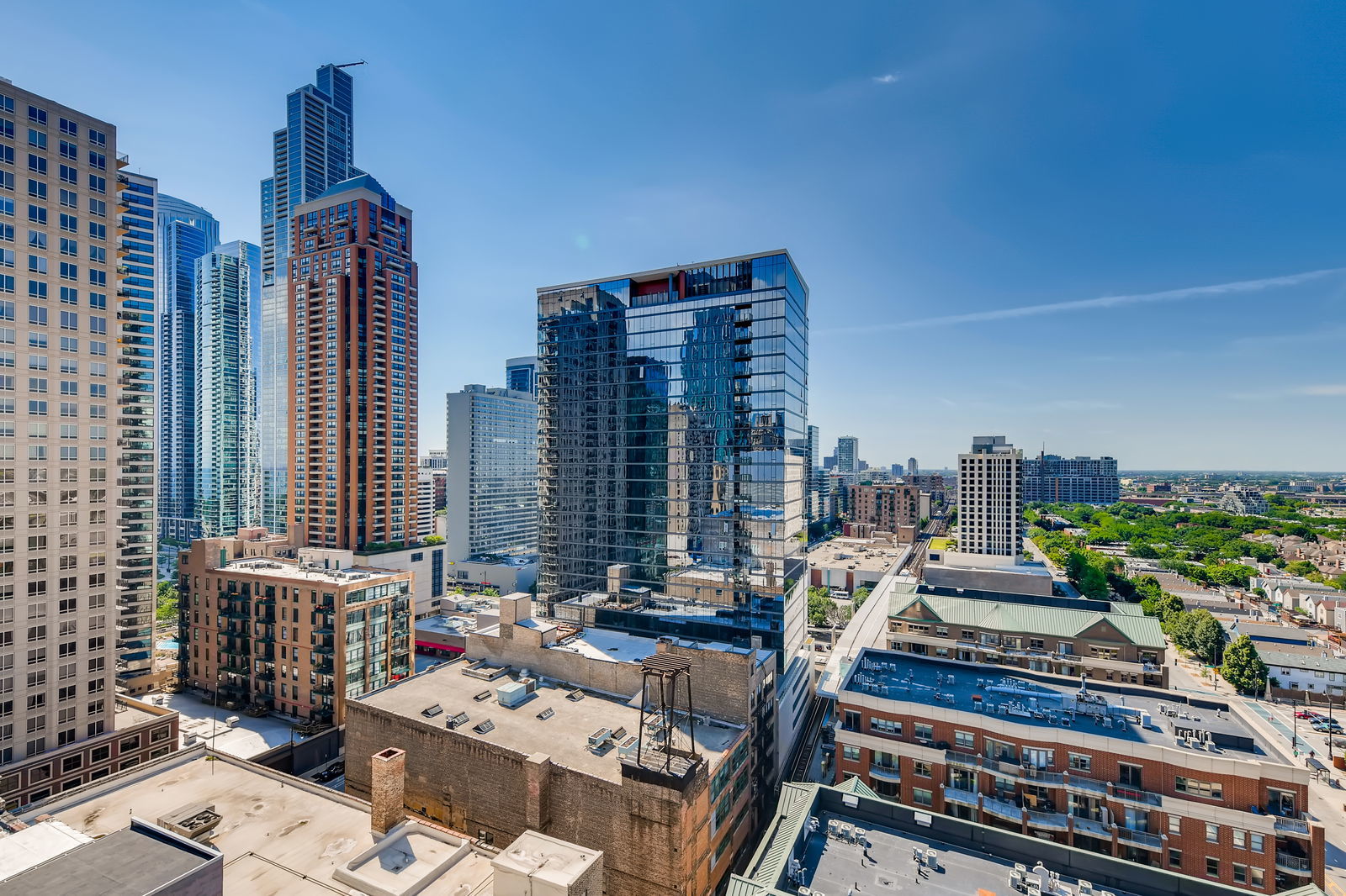 1101 South State Street, Unit 1805 Chicago, IL 60605 - Photo 19 of 21 a view of roof deck with furniture and city view