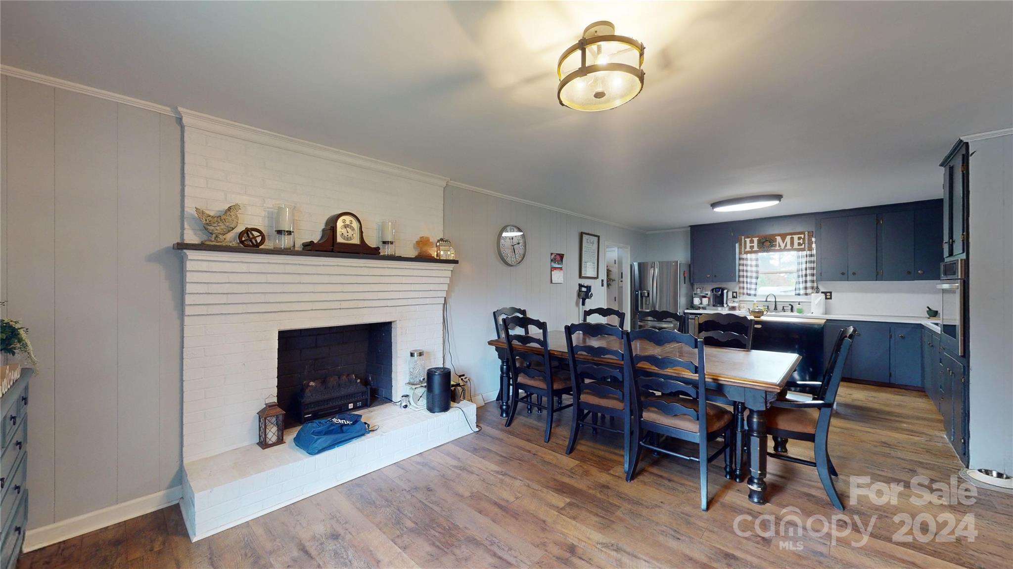 3406 Beaty Road Gastonia, NC 28056 - Photo 4 of 34 a view of a livingroom with furniture window and wooden floor