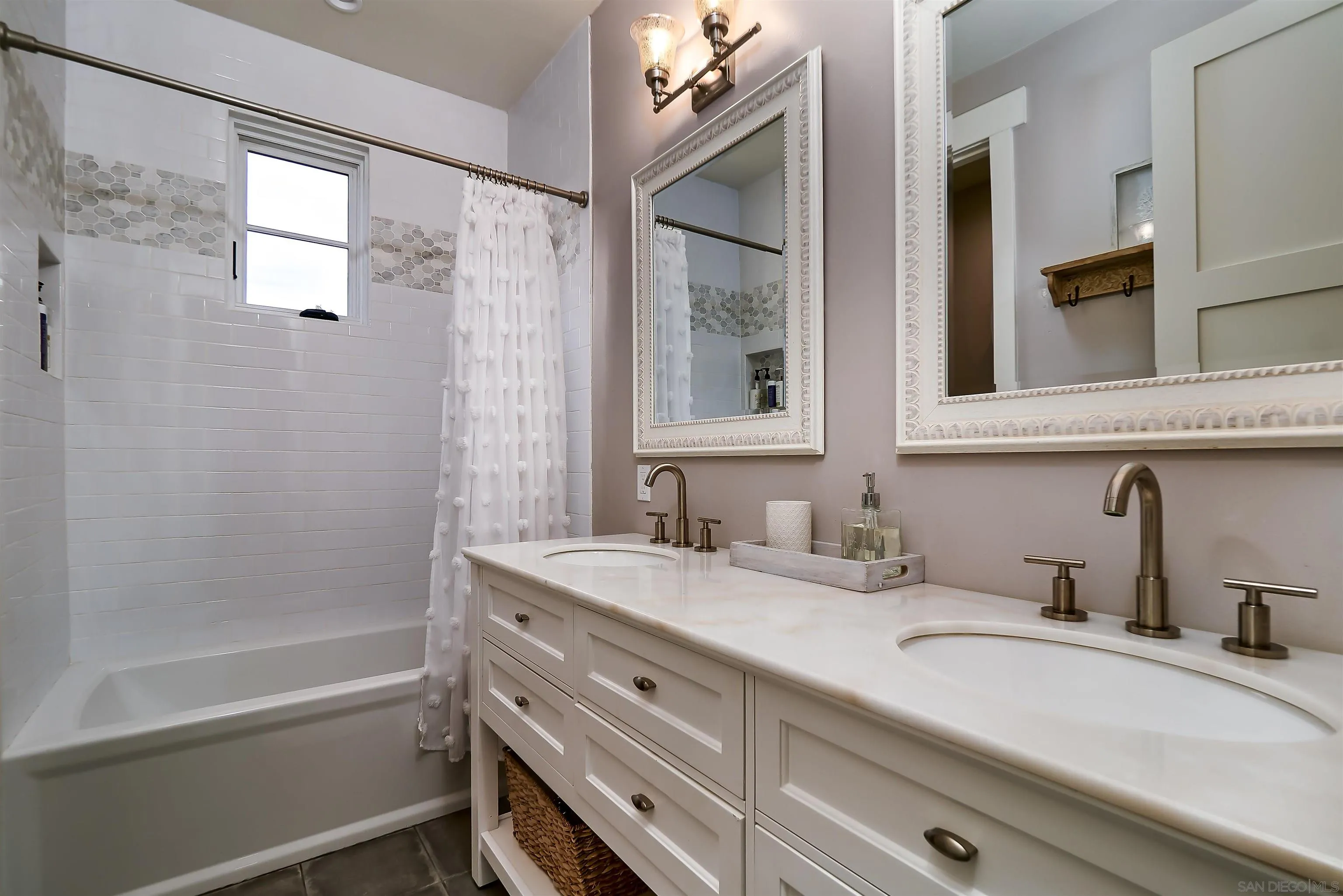 20104 Questhaven Road Elfin Forest, CA 92029 - Photo 29 of 33 a bathroom with a tub sink and mirror