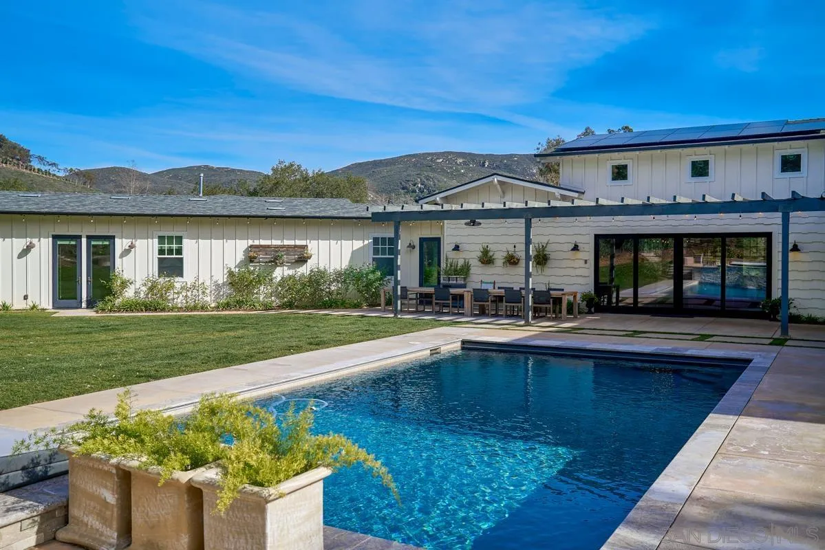 20104 Questhaven Road Elfin Forest, CA 92029 - Photo 5 of 33 a view of house with swimming pool outdoor seating