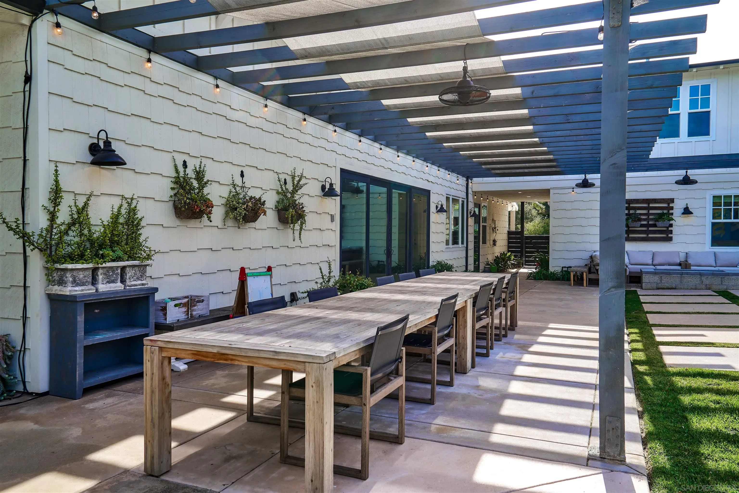 20104 Questhaven Road Elfin Forest, CA 92029 - Photo 8 of 33 a view of a dinning table and chairs in patio