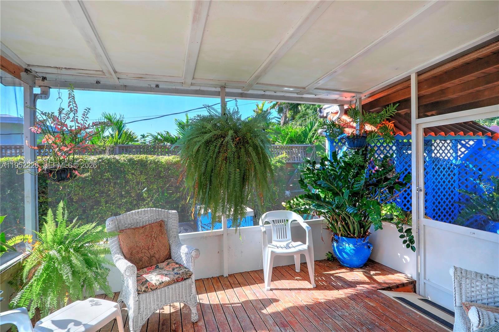 3030 Southwest 57th Avenue Miami, FL 33155 - Photo 7 of 12 a view of a backyard with plants and a patio