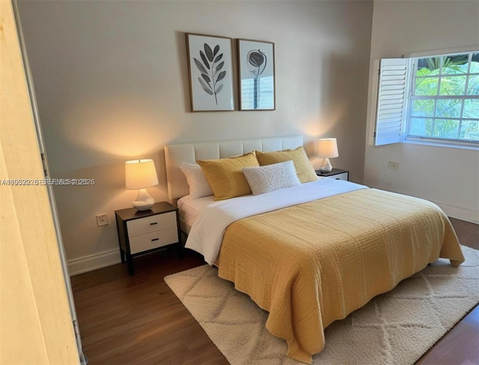 3030 Southwest 57th Avenue Miami, FL 33155 - Photo 10 of 12 a bedroom with bed and window