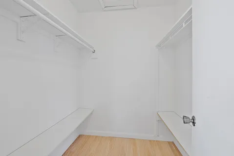 a view of a porch with wooden floor