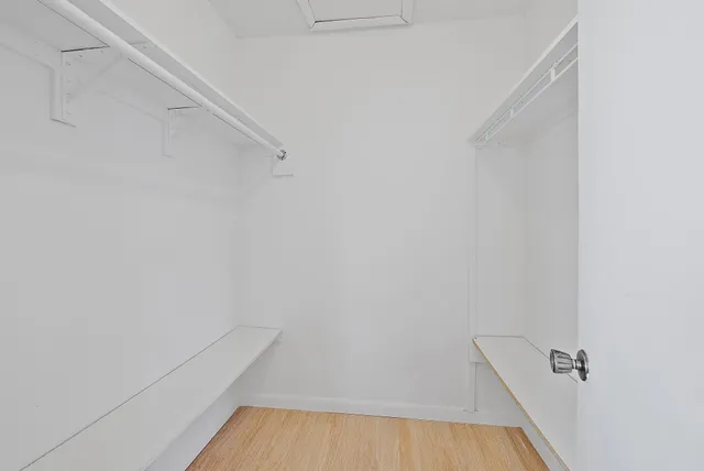 a view of a porch with wooden floor