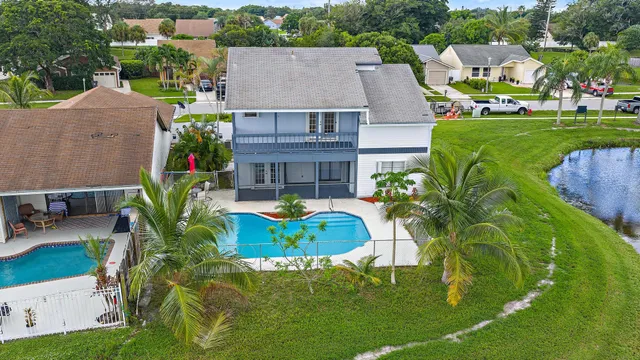 an aerial view of a house with a garden