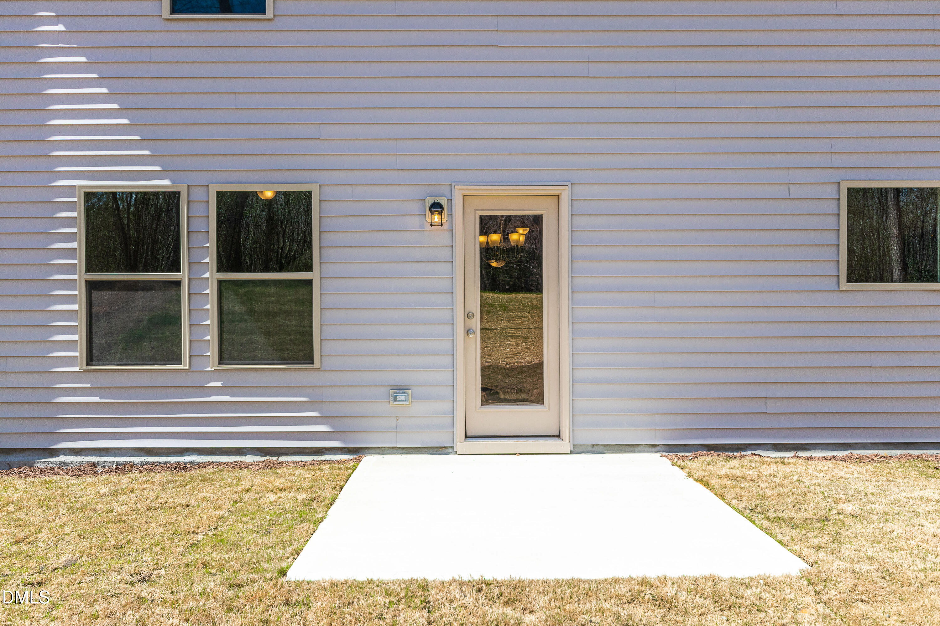 3309 Slippery Elm Drive Raleigh, NC 27610 - Photo 11 of 29 a view of a brick house with a large window