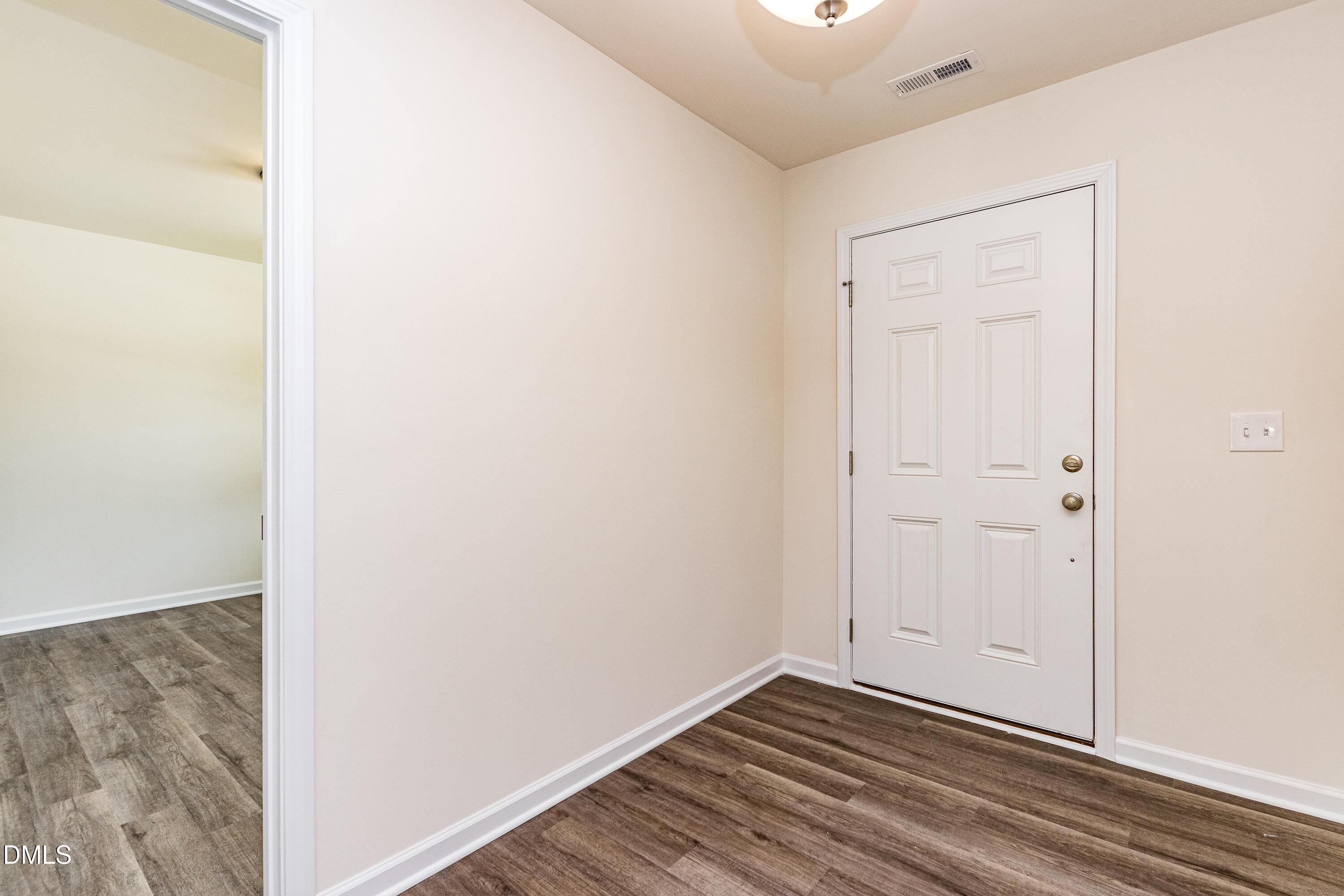 3309 Slippery Elm Drive Raleigh, NC 27610 - Photo 12 of 29 a view of a room with wooden floor
