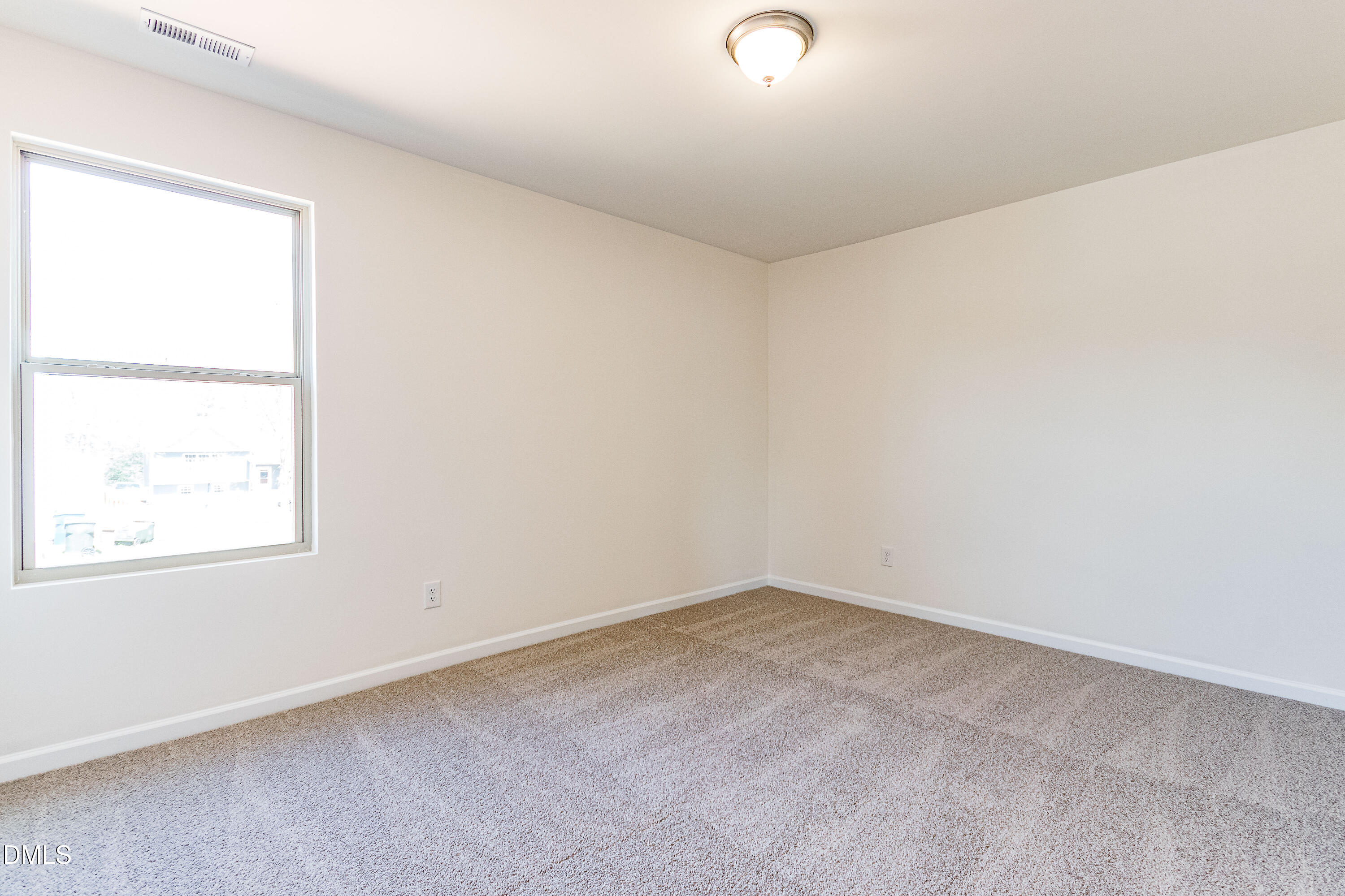 3309 Slippery Elm Drive Raleigh, NC 27610 - Photo 18 of 29 an empty room with a window