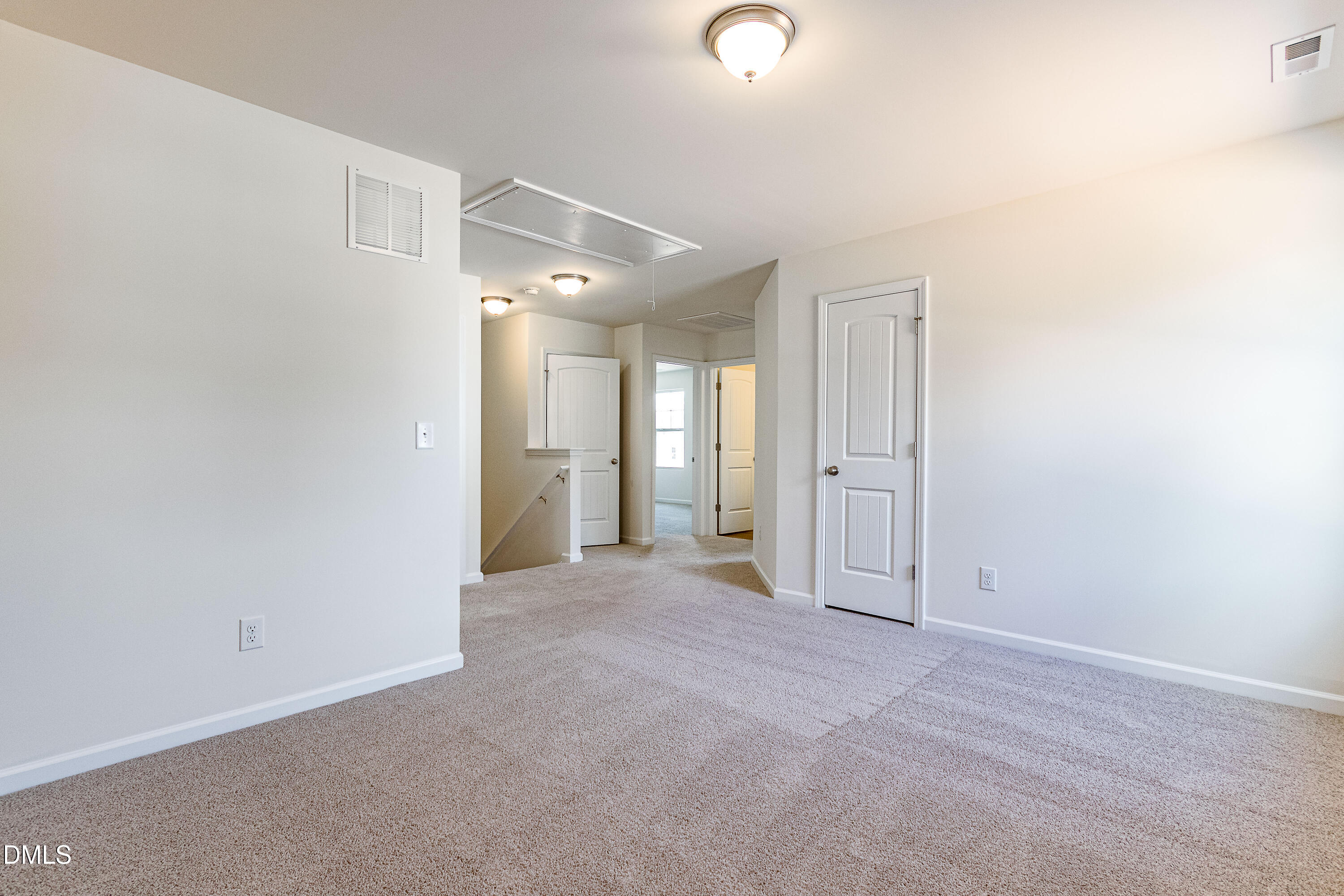 3309 Slippery Elm Drive Raleigh, NC 27610 - Photo 20 of 29 an empty room with entrance and windows