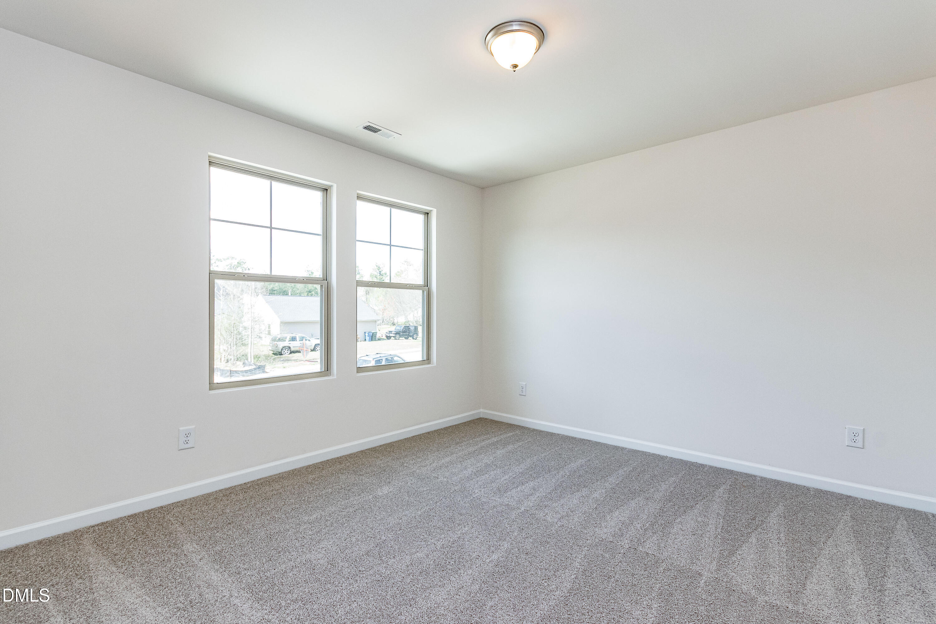 3309 Slippery Elm Drive Raleigh, NC 27610 - Photo 21 of 29 an empty room with a window