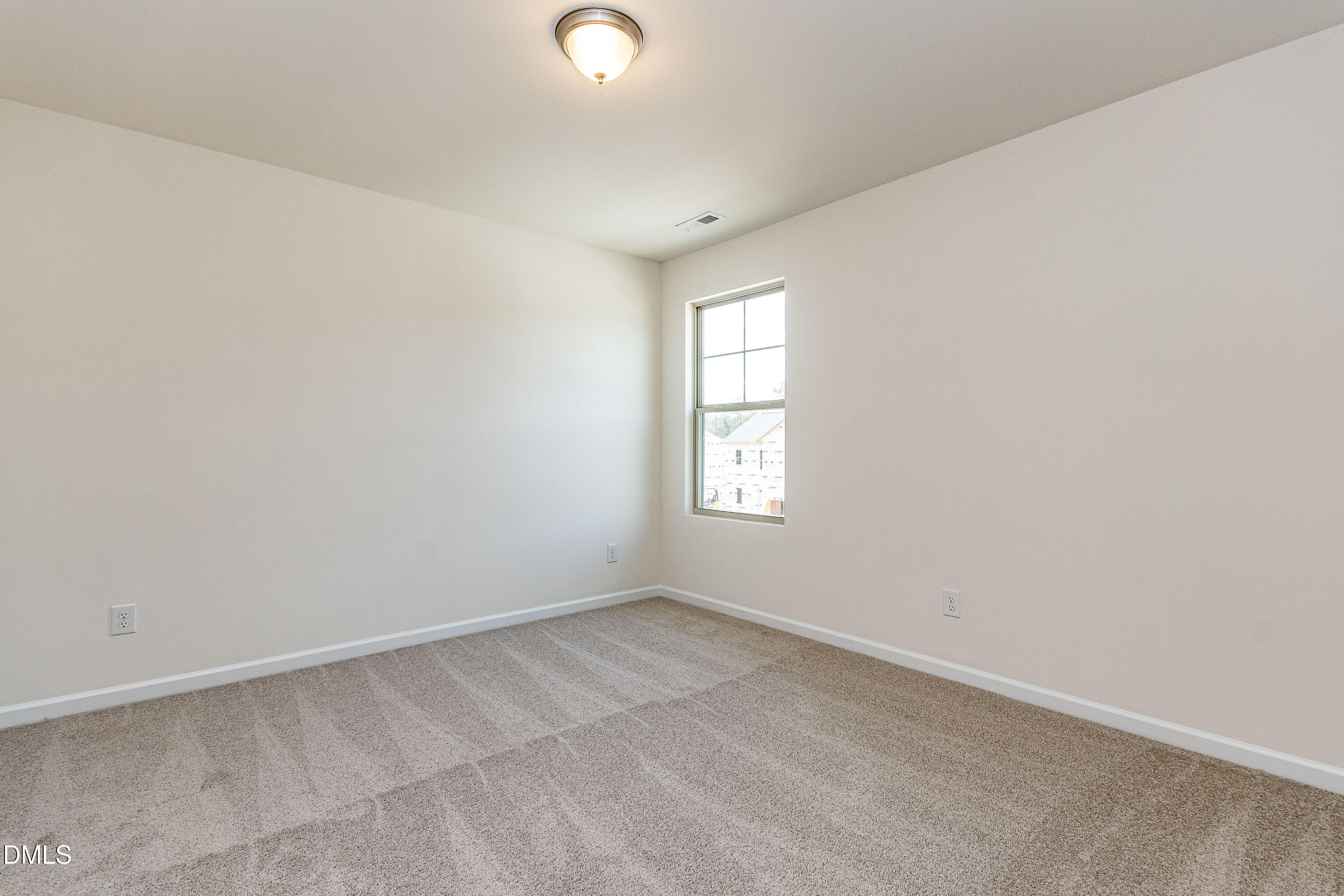 3309 Slippery Elm Drive Raleigh, NC 27610 - Photo 22 of 29 an empty room with windows