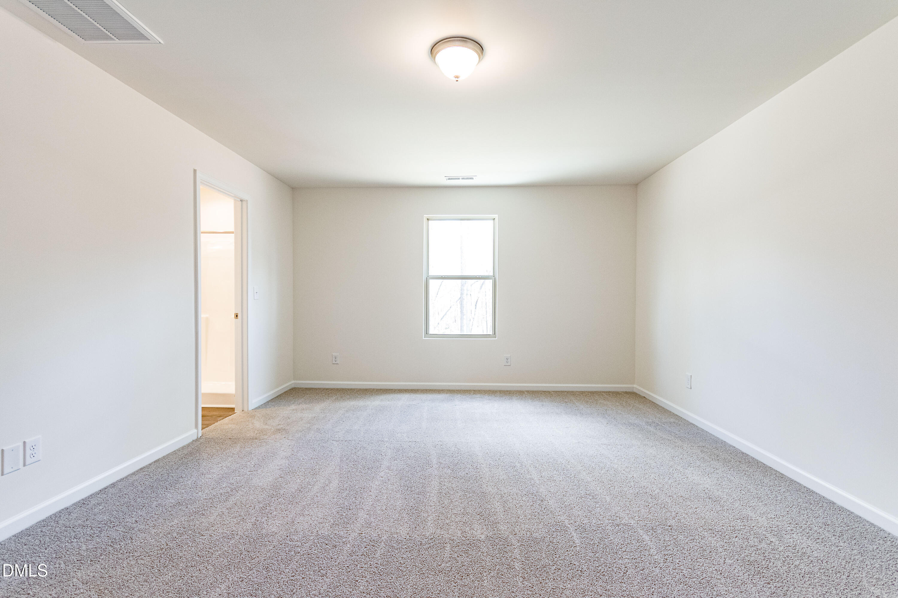 3309 Slippery Elm Drive Raleigh, NC 27610 - Photo 24 of 29 an empty room with a window