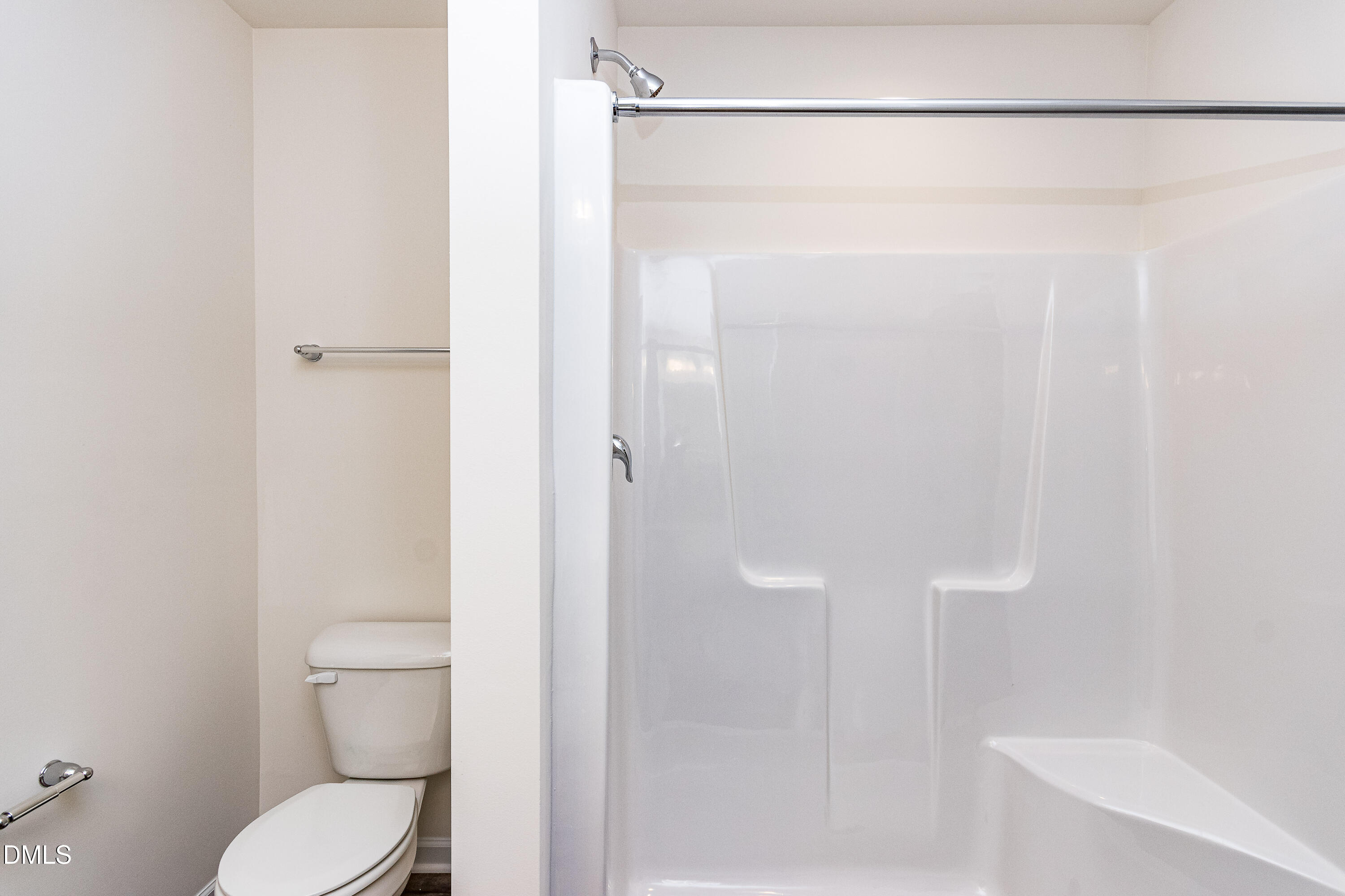 3309 Slippery Elm Drive Raleigh, NC 27610 - Photo 27 of 29 a bathroom with a shower and a toilet