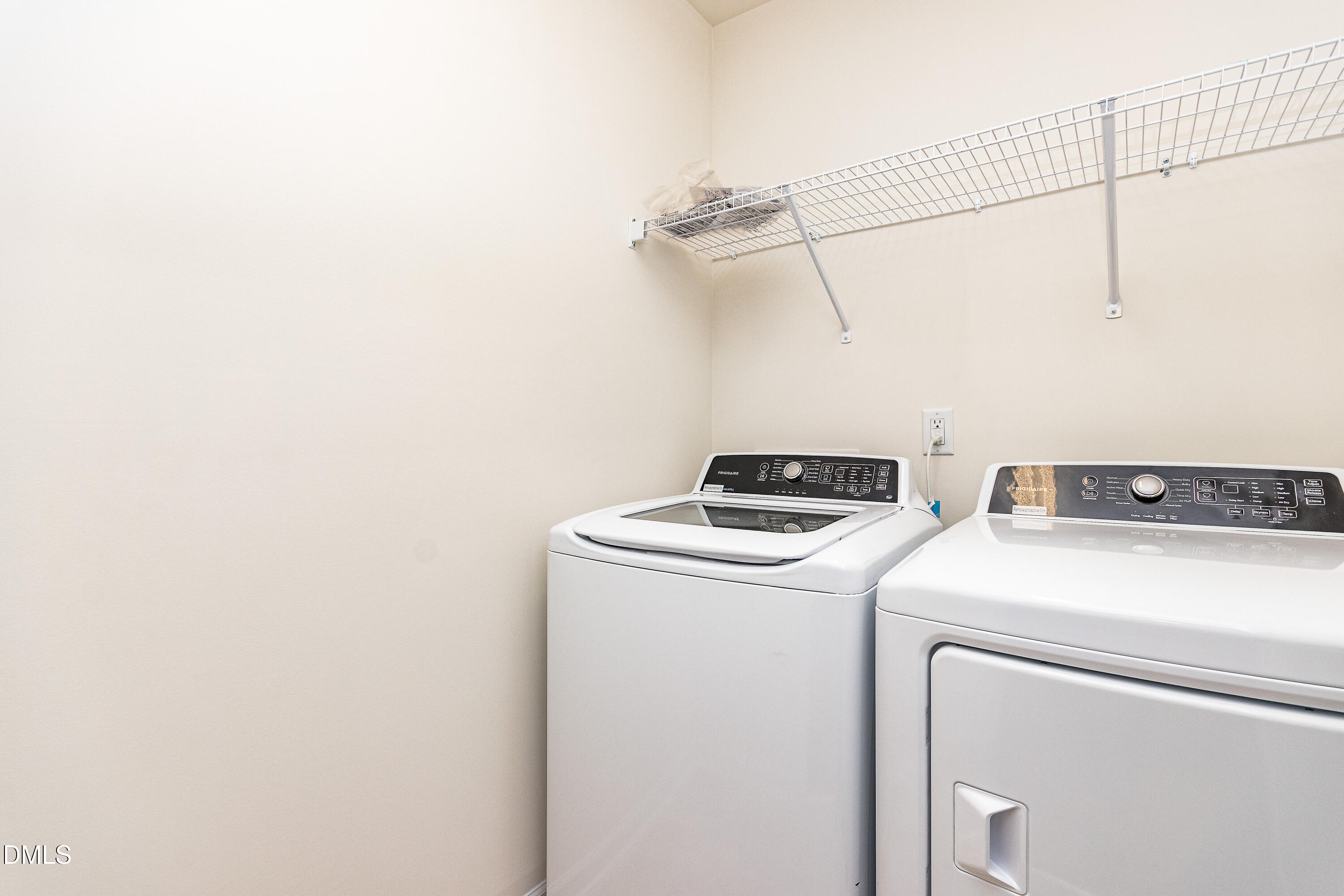 3309 Slippery Elm Drive Raleigh, NC 27610 - Photo 29 of 29 a utility room with dryer and washer
