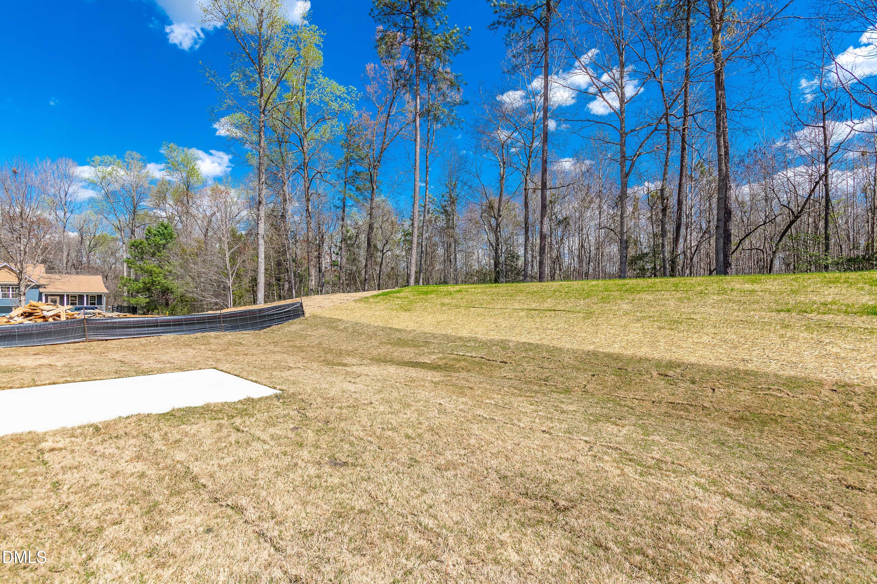 3309 Slippery Elm Drive Raleigh, NC 27610 - Photo 6 of 29 a view of an outdoor space and a yard