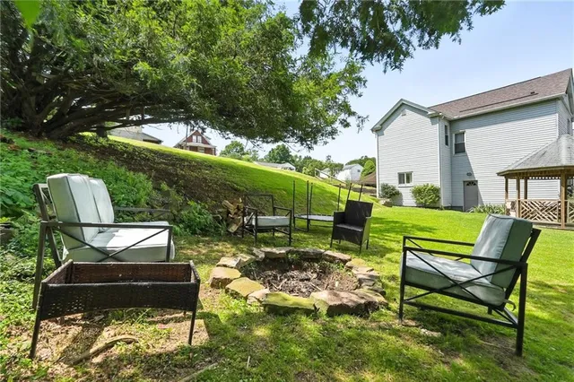 a view of a two chairs in a patio
