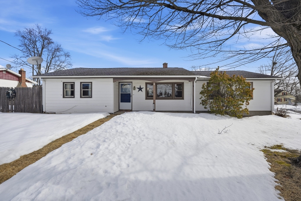 325 Granby Road Chicopee, MA 01013 - Photo 1 of 36 front view of house with a yard