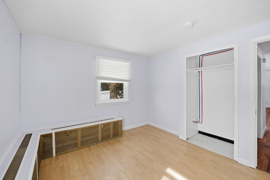 325 Granby Road Chicopee, MA 01013 - Photo 18 of 36 a room with a bed