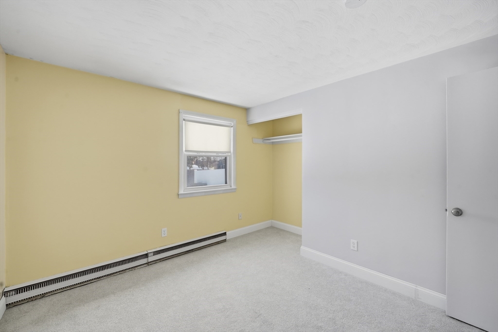 325 Granby Road Chicopee, MA 01013 - Photo 20 of 36 an empty room with windows
