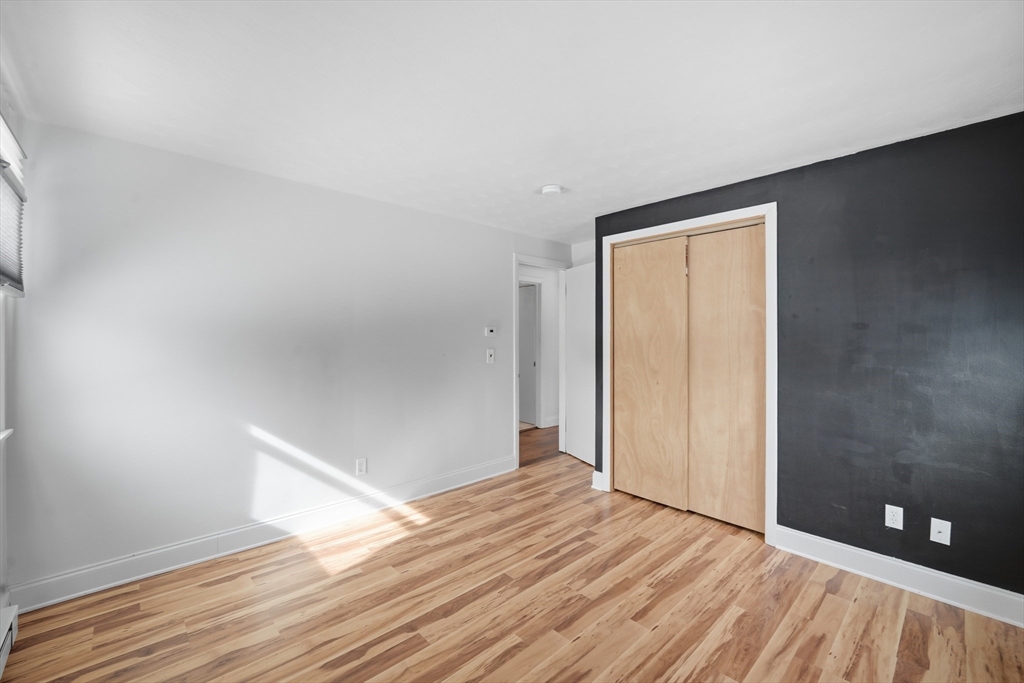 325 Granby Road Chicopee, MA 01013 - Photo 24 of 36 a view of empty room with wooden floor