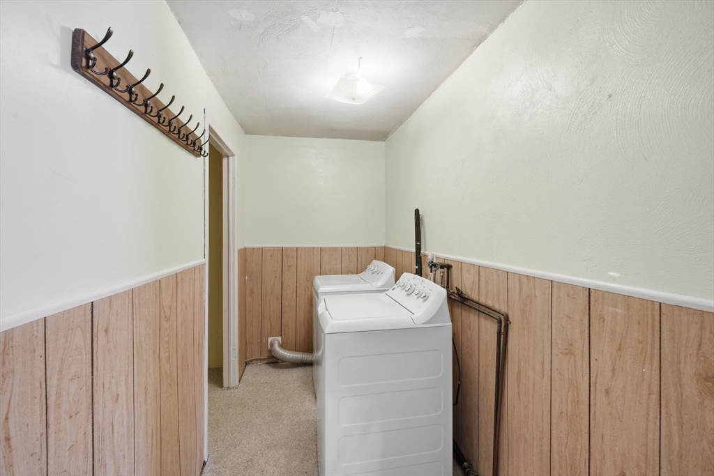 325 Granby Road Chicopee, MA 01013 - Photo 31 of 36 a utility room with dryer and washer