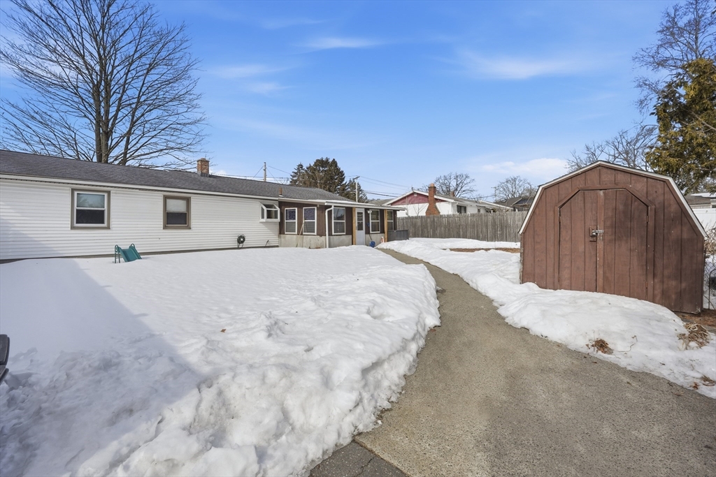 325 Granby Road Chicopee, MA 01013 - Photo 5 of 36 a view of a backyard of the house