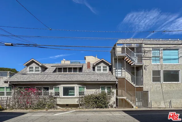 a front view of a house with yard