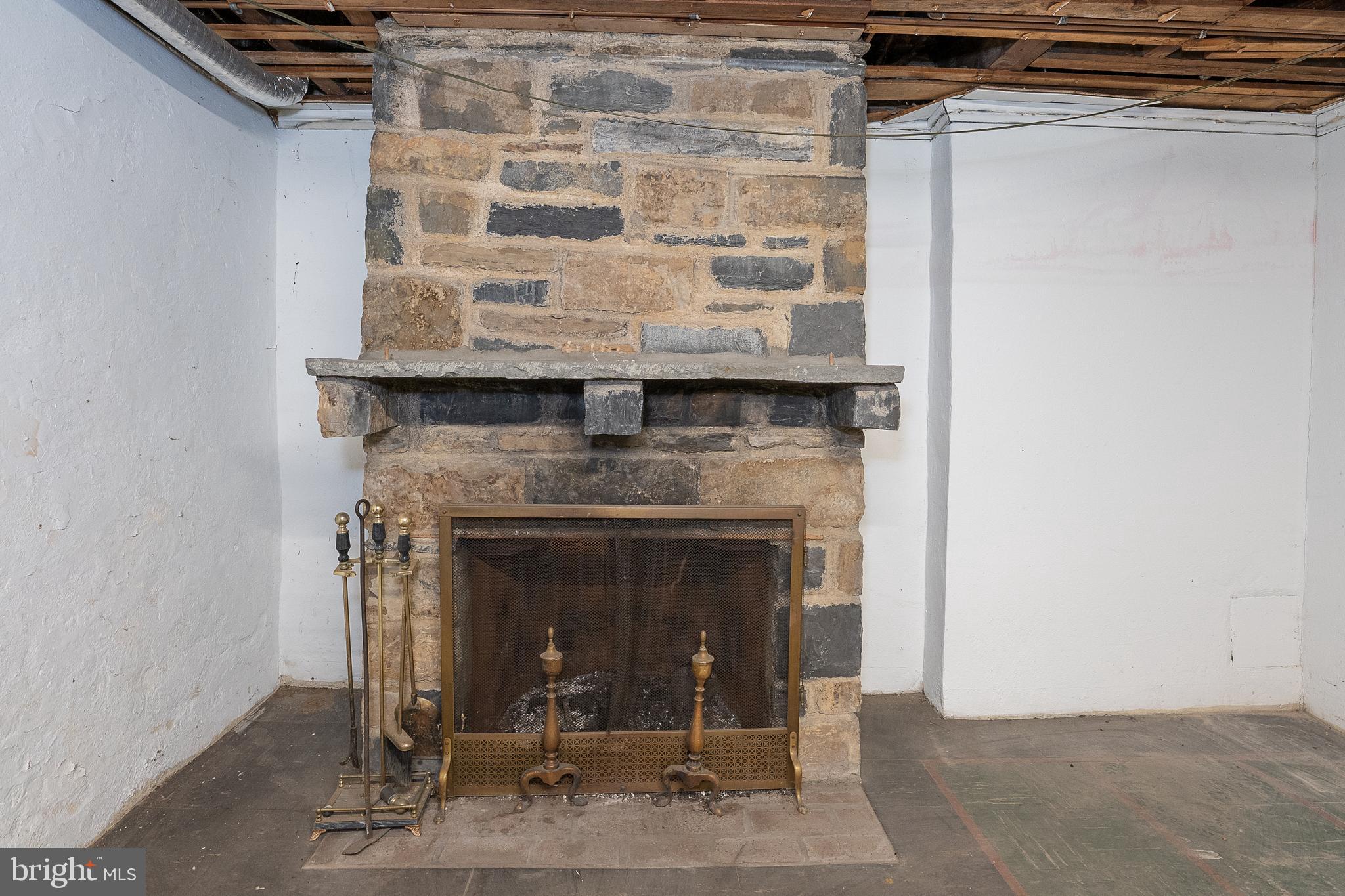 1121 North Trooper Road Eagleville, PA 19403 - Photo 43 of 70 Basement fireplace