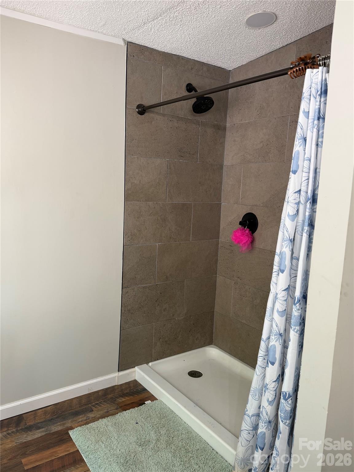 929 Brookhaven Road Statesville, NC 28625 - Photo 19 of 36 a bathroom with a shower and a sink