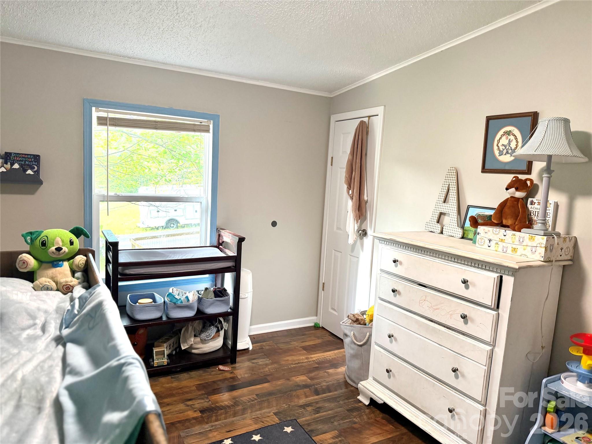929 Brookhaven Road Statesville, NC 28625 - Photo 22 of 36 a bed room with a bed and a window
