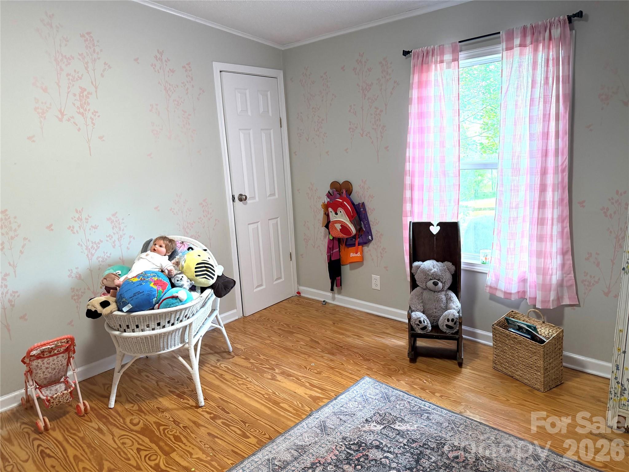 929 Brookhaven Road Statesville, NC 28625 - Photo 24 of 36 a living room with furniture and a floor to ceiling window