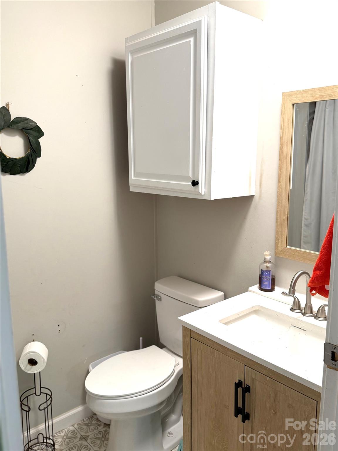929 Brookhaven Road Statesville, NC 28625 - Photo 25 of 36 a bathroom with a sink and a toilet
