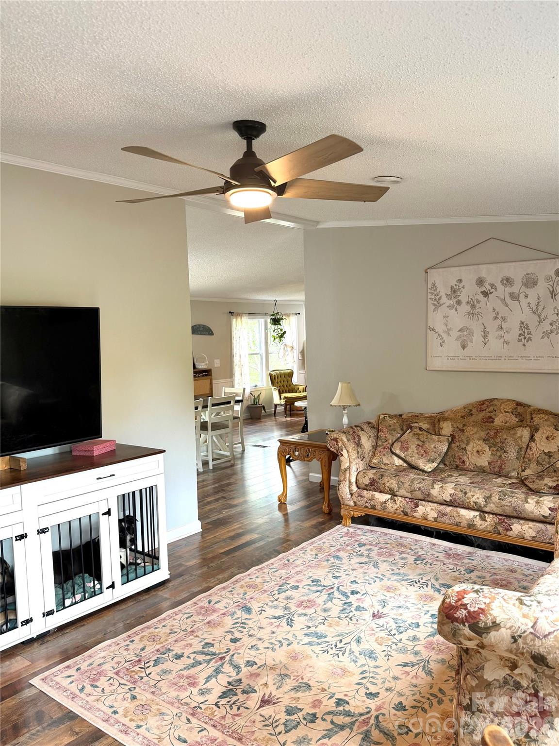929 Brookhaven Road Statesville, NC 28625 - Photo 5 of 36 a living room with furniture and a flat screen tv