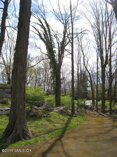 198 A Valley Road Cos Cob, CT 06807 - Photo 1 of 7 a view of a park that has large trees
