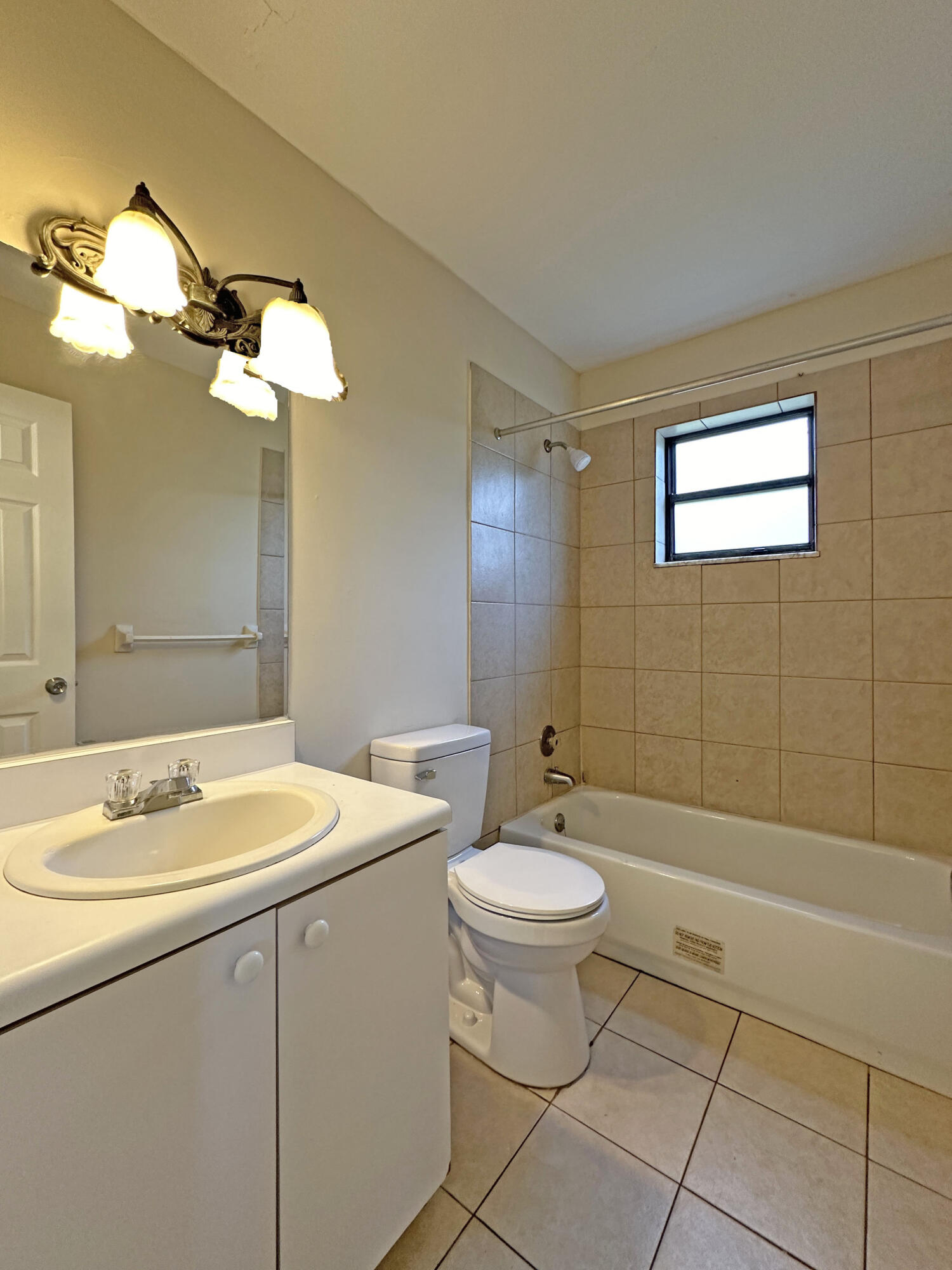 1021 Southeast Monterey Road, Unit A22 Stuart, FL 34994 - Photo 7 of 17 IMG_4988 ed