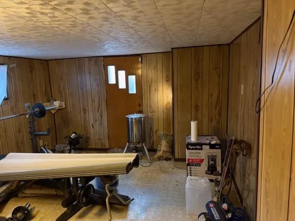 a view of small space with wooden door