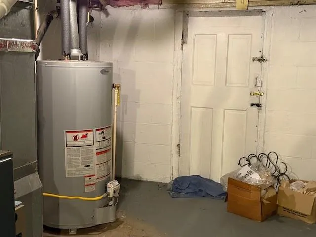 a view of a house with snow on the road