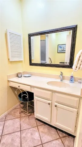 a bathroom with a sink and a shower