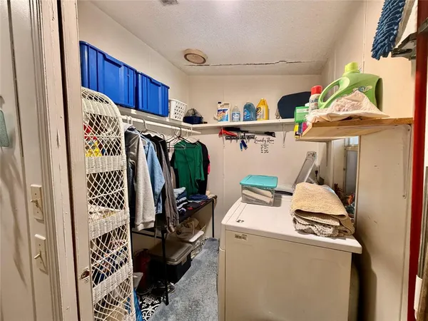 a room with storage and utility