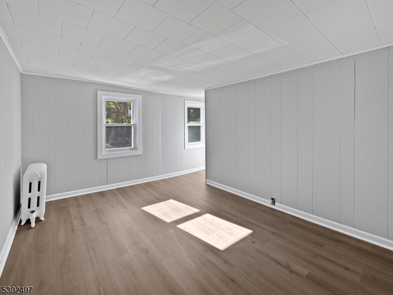 5 Orams Lane Oxford, NJ 07863 - Photo 15 of 31 an empty room with wooden floor and windows